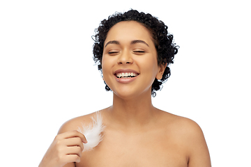 Image showing happy african american woman with feather