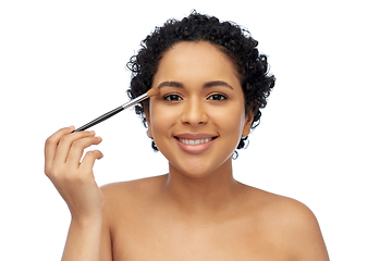 Image showing african american woman with make up brush