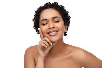 Image showing young african american woman with moisturizer