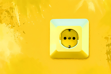 Image showing Electric socket on bright yellow wall 