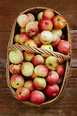 Image showing Bright ripe apples in a basket