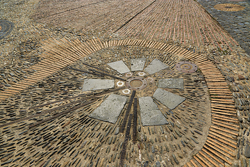 Image showing Unusual pavement with creative pattern from metal details, sea p