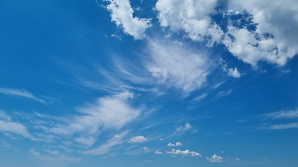 Image showing Blue sky with clouds. Beautiful natural background. Ready to wallpaper