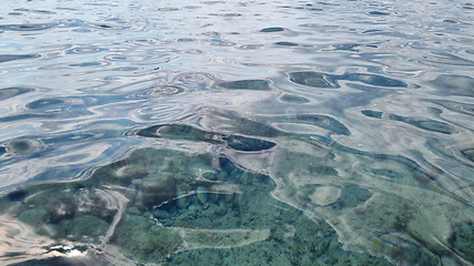 Image showing Ripple water and surface in sea. Beautiful motion gentle wave in the sea