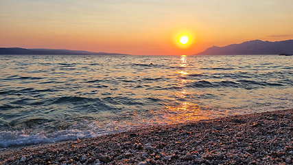 Image showing Beautiful red sunset over the Adriatic sea. Makarska Riviera-Biokovo, Dalmatia, Croatia, Europe
