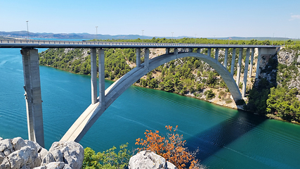 Image showing Highway Krka Bridge over the Krka river, town of Skradin in background, Croatia