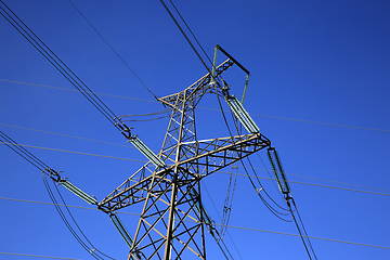 Image showing Overhead Transmission Lines against Blue Sky