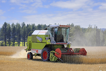 Image showing Harvesting Wheat with Claas Dominator 48S Combine Harvester