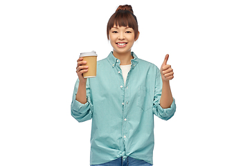 Image showing asian woman with coffee cup showing thumbs up