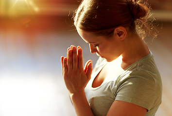 Image showing close up of woman meditating at yoga studio