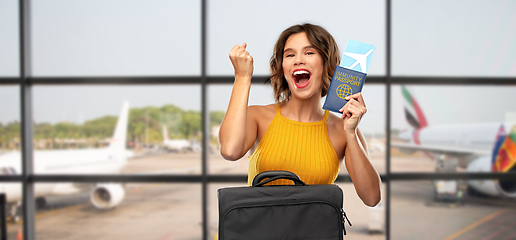 Image showing happy woman with air ticket and immunity passport