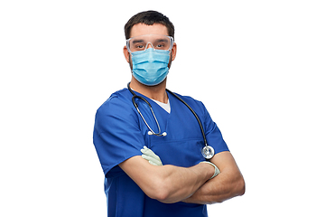 Image showing male doctor in goggles, mask and gloves
