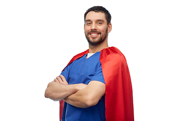 Image showing smiling doctor or male nurse in superhero cape