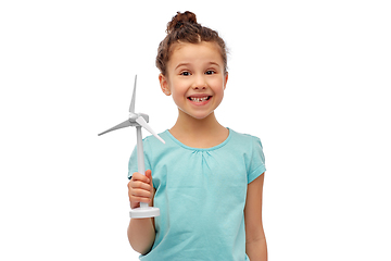 Image showing smiling girl with toy wind turbine