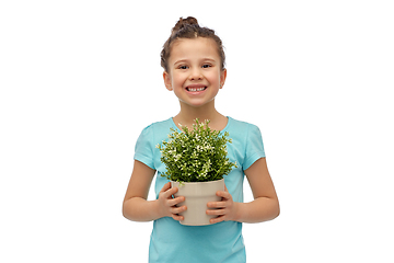 Image showing happy smiling girl holding flower in pot