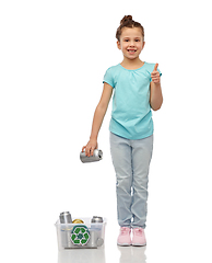 Image showing girl sorting metallic waste and showing thumbs up