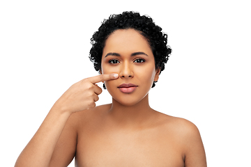 Image showing young african american woman pointing to her nose