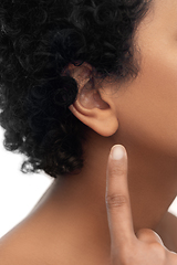 Image showing close up of african american woman's ear