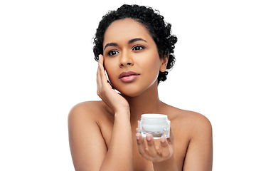 Image showing young african american woman with moisturizer