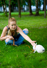 Image showing girl with rabbit