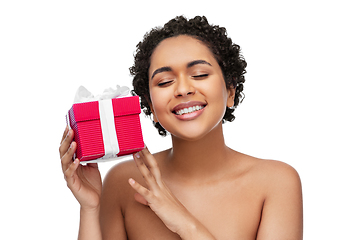 Image showing portrait of young african american woman with gift