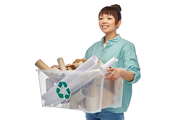 Image showing happy smiling asian woman sorting paper waste