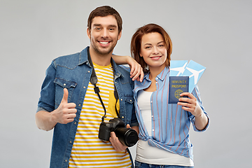 Image showing couple with tickets, immunity passport and camera