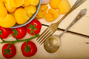 Image showing Italian snail lumaconi pasta with tomatoes