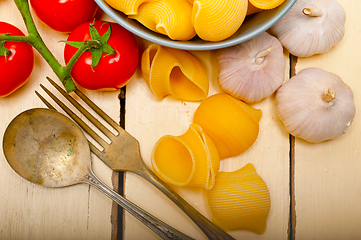 Image showing Italian snail lumaconi pasta with tomatoes