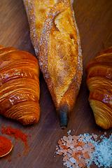 Image showing French fresh croissants and artisan baguette tradition