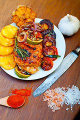 Image showing roasted grilled BBQ chicken breast with herbs and spices