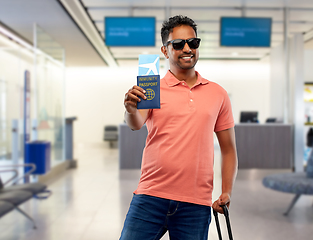 Image showing happy man with air ticket and immunity passport