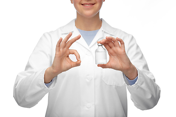 Image showing close up of doctor with medicine showing ok sign