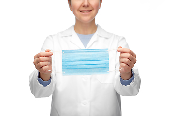 Image showing female doctor showing medical mask