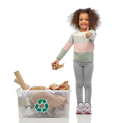 Image showing smiling african american girl sorting paper waste