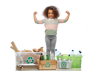 Image showing happy girl sorting paper, metal and plastic waste