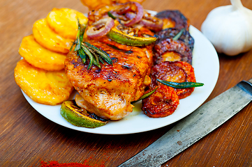 Image showing roasted grilled BBQ chicken breast with herbs and spices