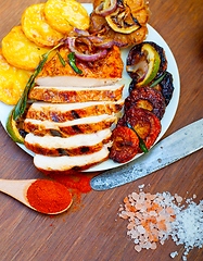 Image showing roasted grilled BBQ chicken breast with herbs and spices