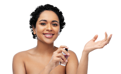 Image showing young african american woman with perfume