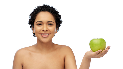 Image showing happy african american woman holding green apple