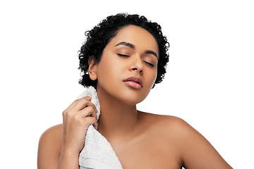 Image showing young african american woman with bath towel