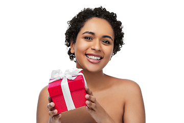 Image showing portrait of young african american woman with gift