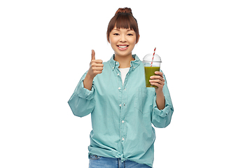 Image showing happy smiling asian woman with can drink