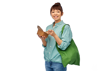 Image showing asian woman with reusable bag for food and wok