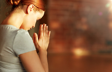 Image showing close up of woman meditating at yoga studio