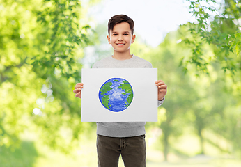Image showing smiling boy holding drawing of earth planet