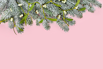 Image showing Christmas Snow Fir Tree Mistletoe Pink Background