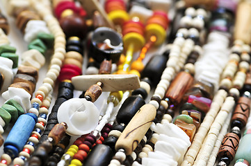 Image showing Wood and seashell bead necklaces