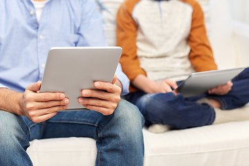 Image showing father and son with tablet pc at home