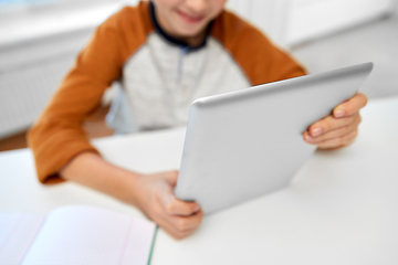 Image showing student boy with tablet computer learning at home